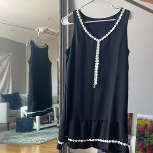 A cute black dress with white flowers